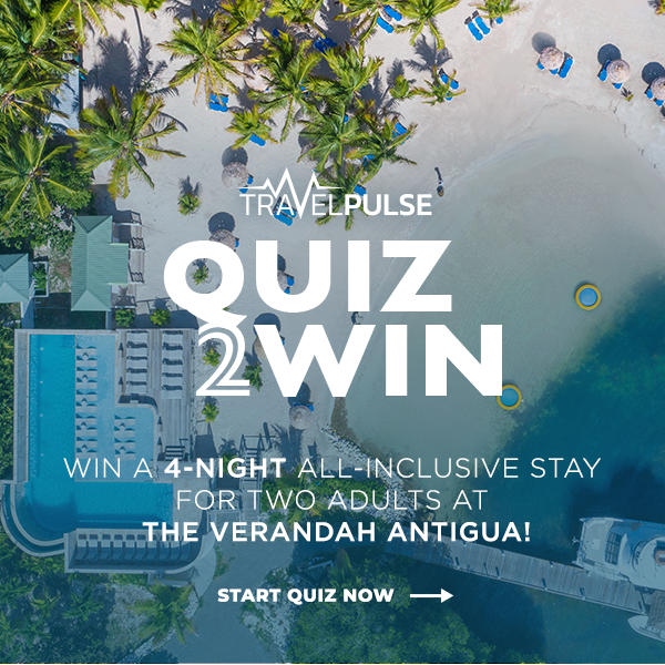Aerial view of a tropical resort area with palm trees, beach, and a swimming pool, promoting a quiz contest for a chance to win a 4-night all-inclusive stay for two adults at The Verandah Antigua. Text overlay: "Quiz 2 Win" and "Start Quiz Now."